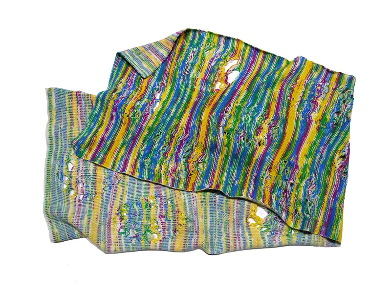 Illustration for article titled Making A Case For Intentional Stitch Glitches And Holey Knits